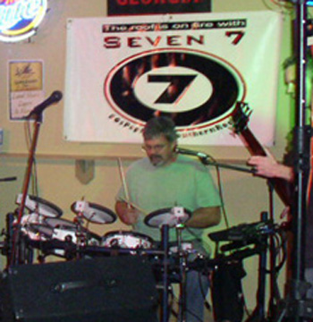 Wayne Dubose formerly or risky business plays drums for Seven 7